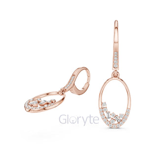 Rose gold earrings with diamond accents on a white background, branded 'Gloryte'.