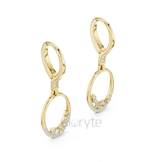 Gold earrings with small diamonds on a white background, branded 'Horizn Studios'.